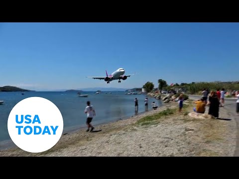 Aircraft enthusiasts blown back by low-landing airplane in Greece | USA TODAY
