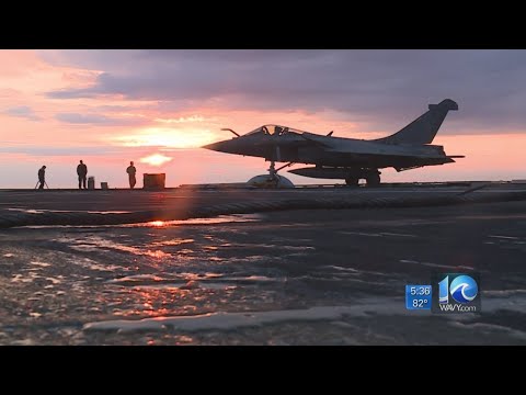 Naval aviators on USS George HW Bush train with French pilots