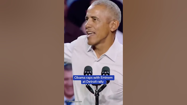 Obama RAPS on stage after Eminem introduces him at a rally in Detroit, Michigan