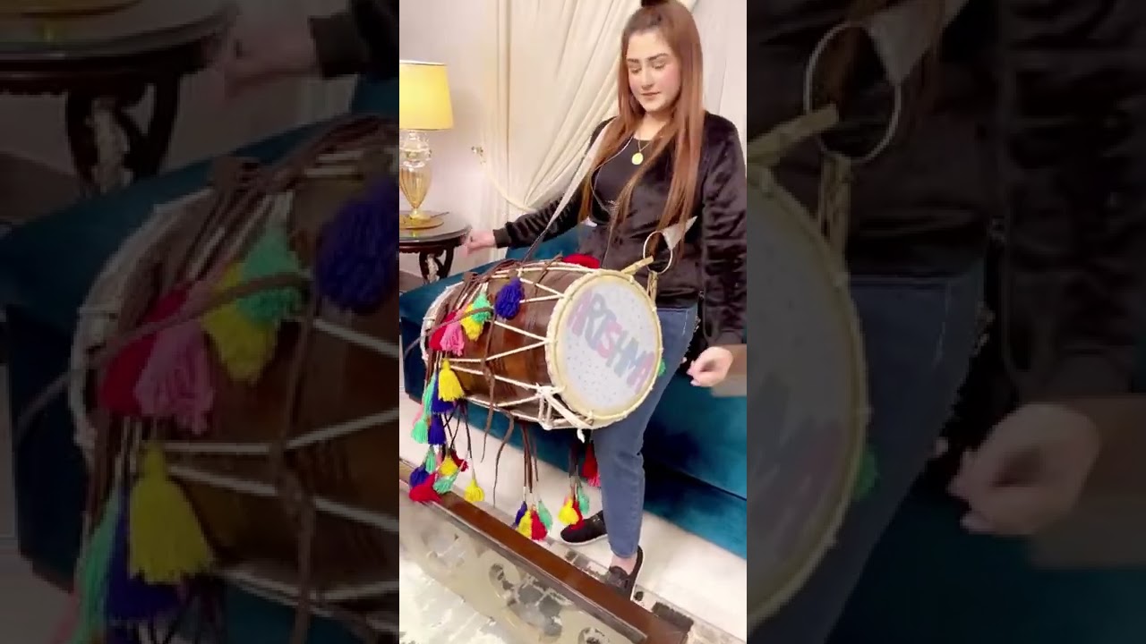 Arishma playing Dhol