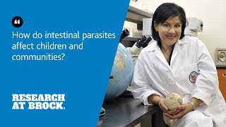 How do intestinal parasites affect children and communities?