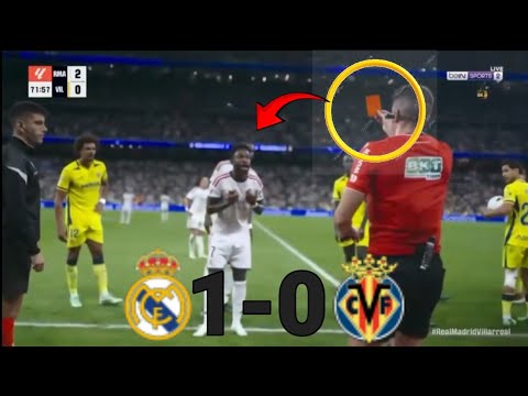 Mad moment: Vinícius clashes with the referee after being shown a red card - and his teammates ho...