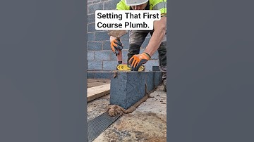 Level across the top of your block to make your wall go up straight #bricklayer #work #tips