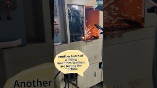 Look, our workers are checking whether the machine is working properly.