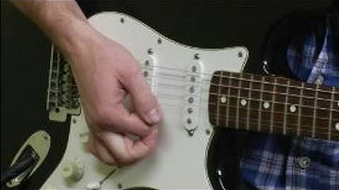 How to Change Strings on an Electric Guitar : How to Stretch & Re-tune Your Guitar Strings