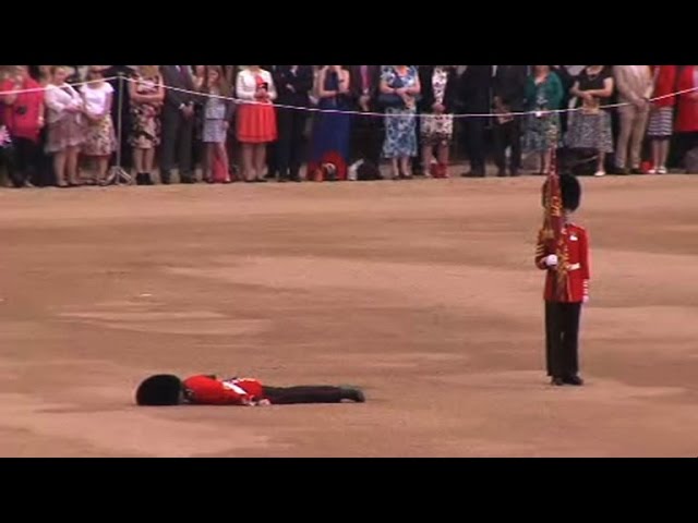Guardsman collapses at Queen's official birthday parade class=
