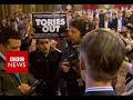 Jacob Rees-Mogg takes on protesters: 'You're a despicable person' - BBC News