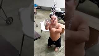 A small man dancing