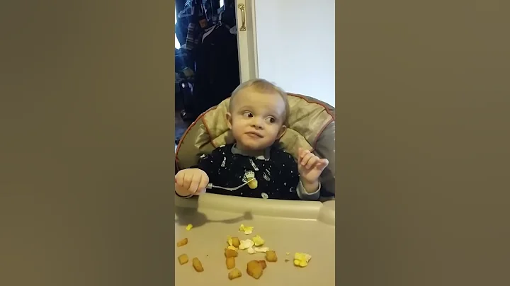 Nephew's first time using silverware