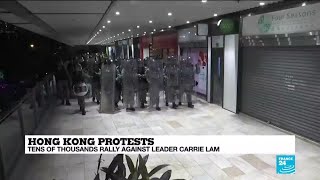 Hong Kong protesters escalate fight in suburbs