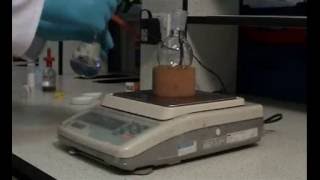 Weighing compounds using a balance
