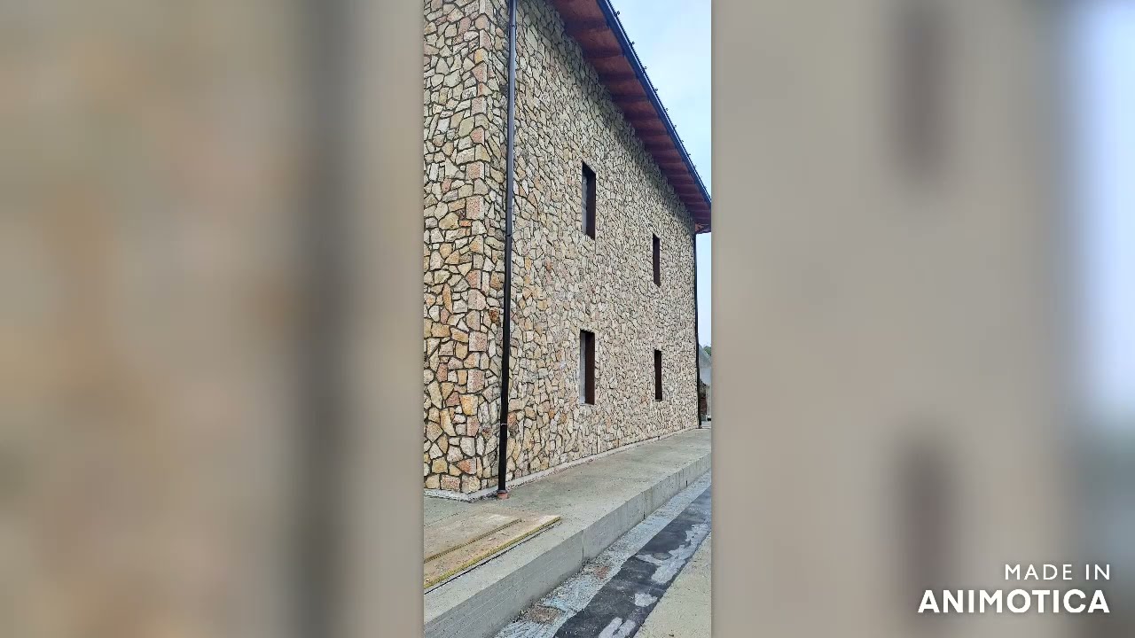 Posa di pietre naturali su cappotto