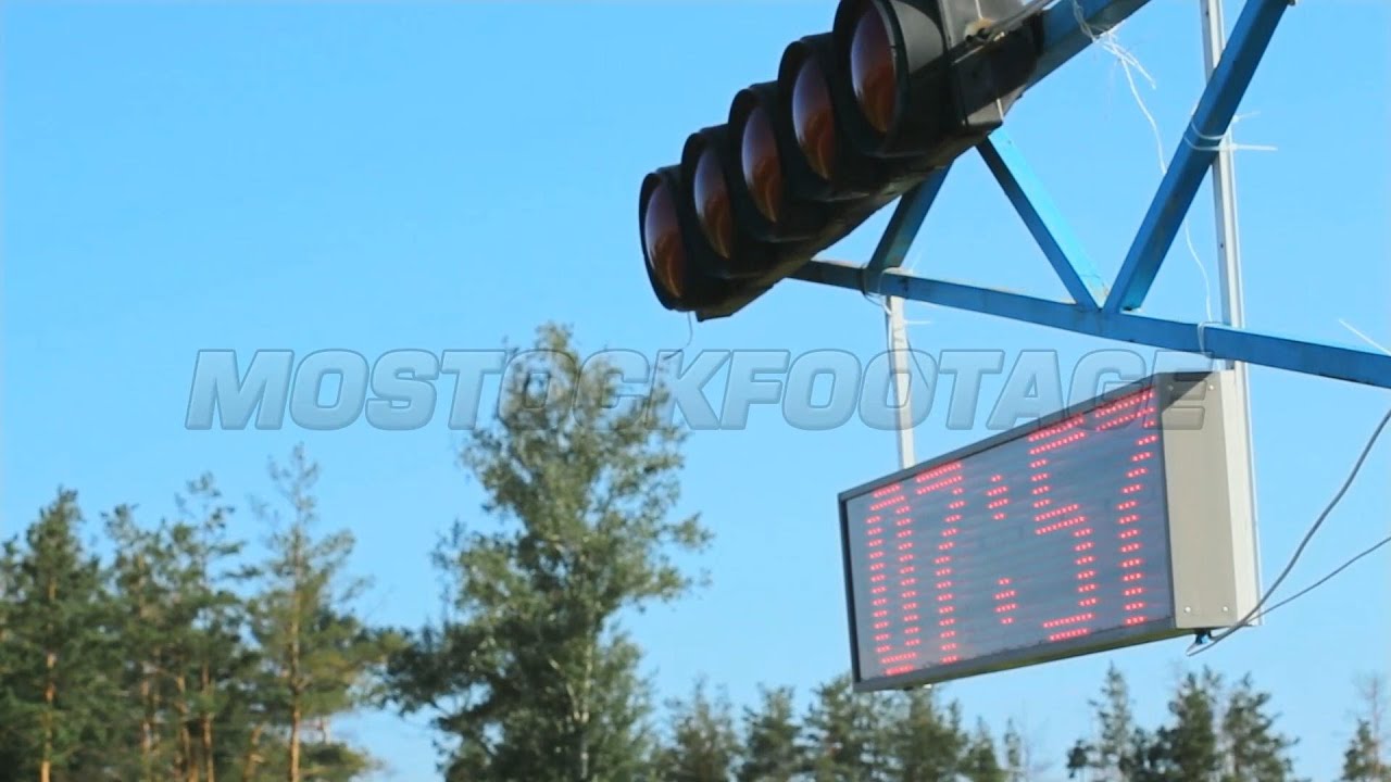 Race countdown clock, passing by cars during racing driving competition. Stock Footage