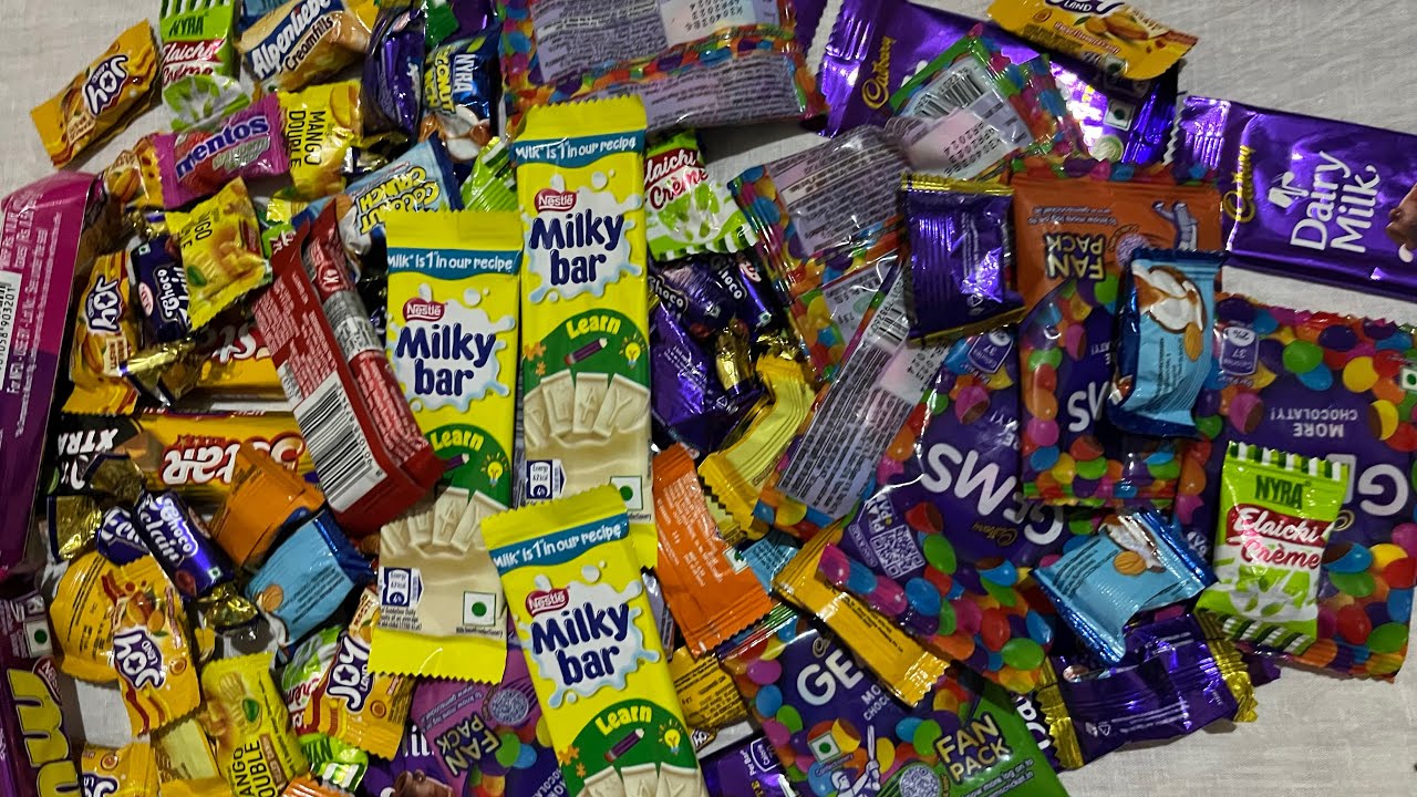 Lots of candies, chocolates Cadbury celebration gems chocolates for