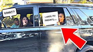 Holding Up "I HATE MY PARENTS" Sign Out The Window PRANK ON MY PARENTS!! *HILARIOUS*