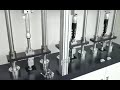 Multi-station spring fatigue testing machine