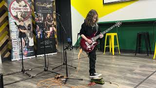 10 year old plays Metallica Seek & Destroy LIVE - solo at 3.40 mins.