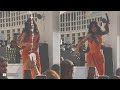 Drink tossed at Cardi B on stage - she fires back with her microphone
