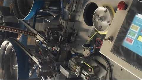 Automatic EE core assembly & taping machine. newwinhk@hotmail.ocm