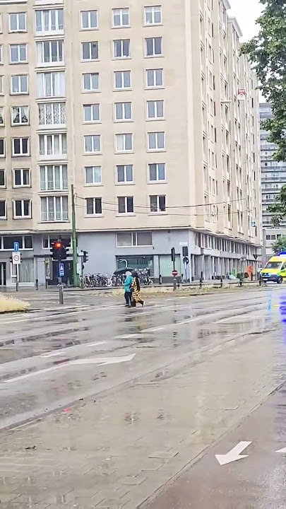 Ambulance with sirene in the Rain