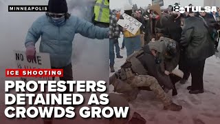Protesters detained in Minneapolis as outrage grows over ICE shooting death