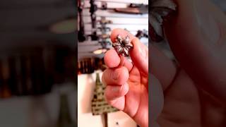 The coolest accessory I own is this hollow point lapel pin.