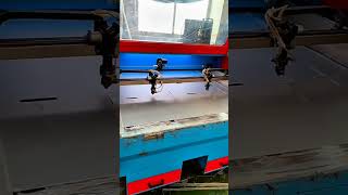 Laser cutting machine engraving sheet material with precision