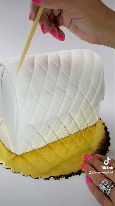 Making a Louis Vuitton purse cake… #pursecake #ediblecake #LV #cakes