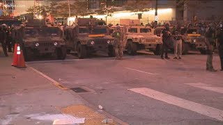 Curfew hits Atlanta, streets clear Downtown