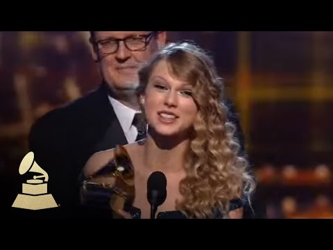 Taylor Swift accepting the GRAMMY for Album of the Year at the 52nd GRAMMY Awards