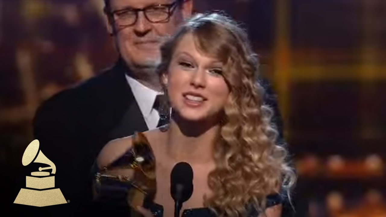 Taylor Swift accepting the GRAMMY for Album of the Year at the 52nd