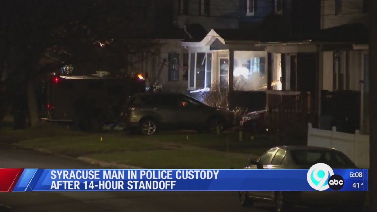 After 14-hour standoff, armed man has been taken into custody - YouTube