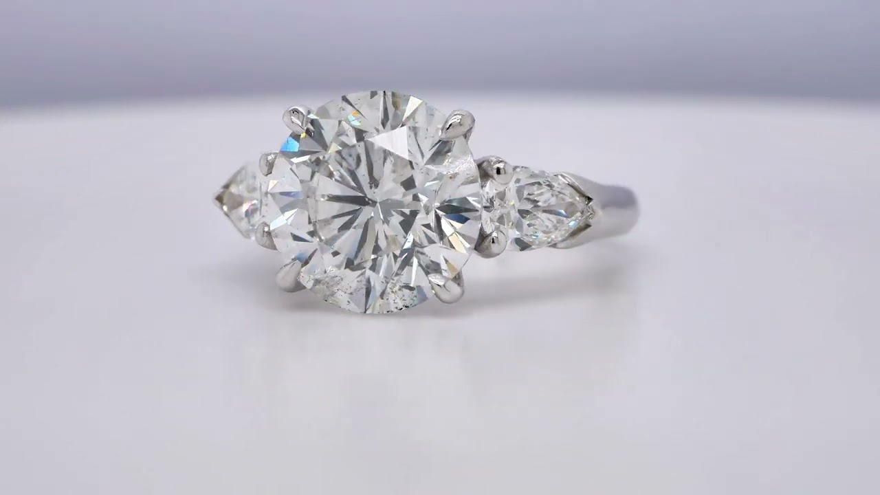 Round Diamond Three Stone Ring In 18K White Gold - Orogem Jewelers