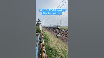 TPE Class 185s passing The Sidings Hotel