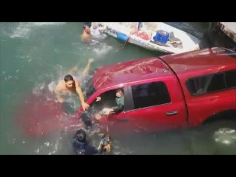 Strangers Rescue 87-Year-Old Woman, Her Son and Dog From Sinking Car