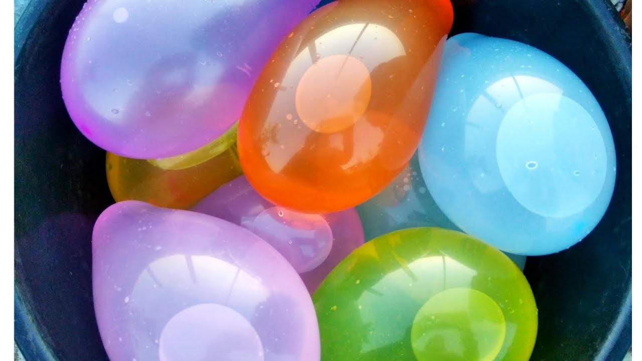 pin popping water balloons / pop colorful balloons