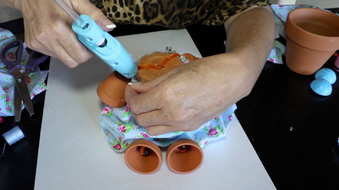 Munecas con Macetas de barro