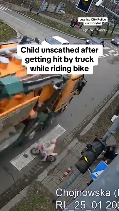 Child unscathed after getting hit by truck while riding bike #shorts