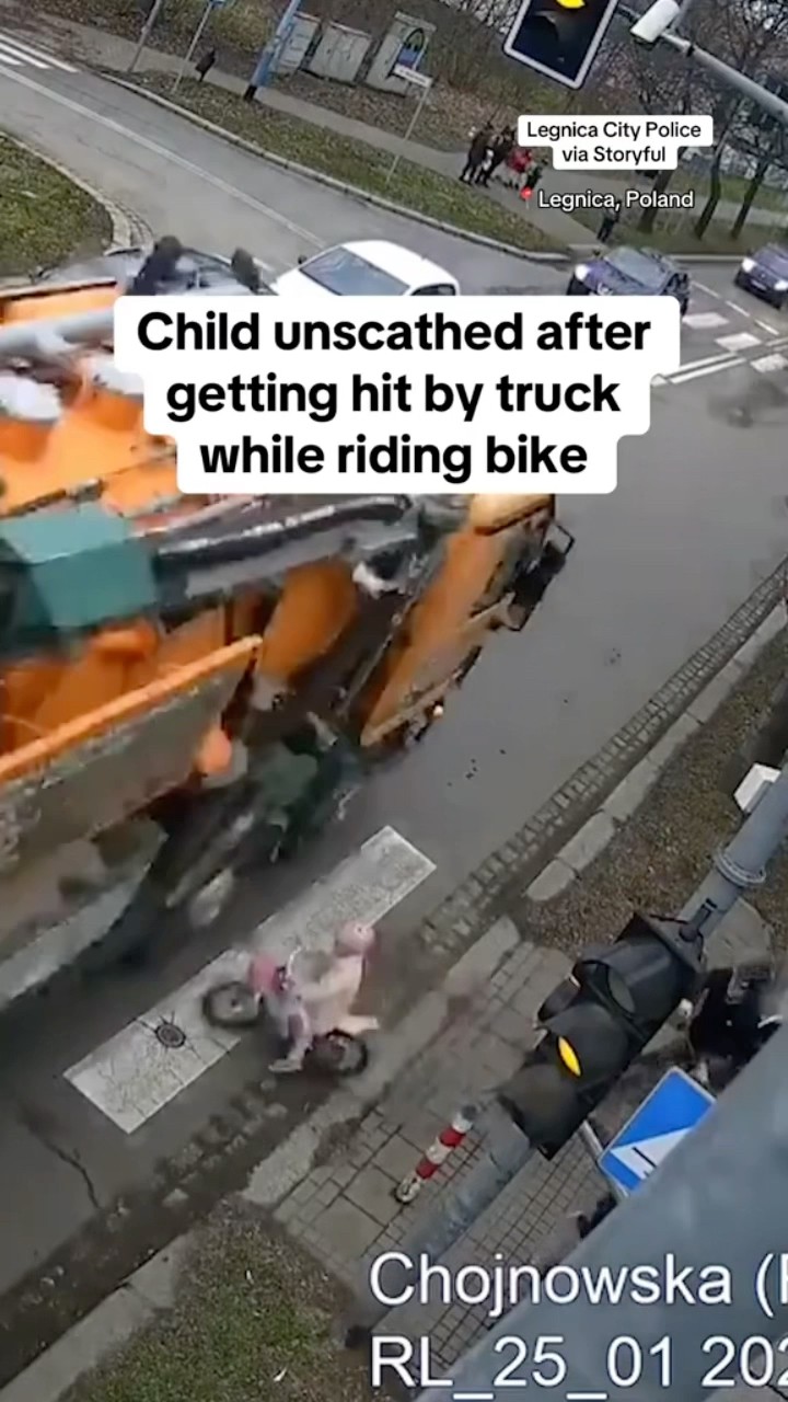 Child unscathed after getting hit by truck while riding bike #shorts
