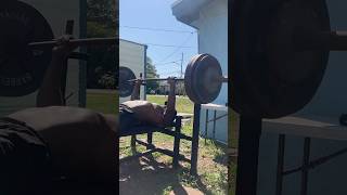 Old school pig iron 335 back yard grit #fyp  #gym #weightlifting #strong #benchpress #strength #fit