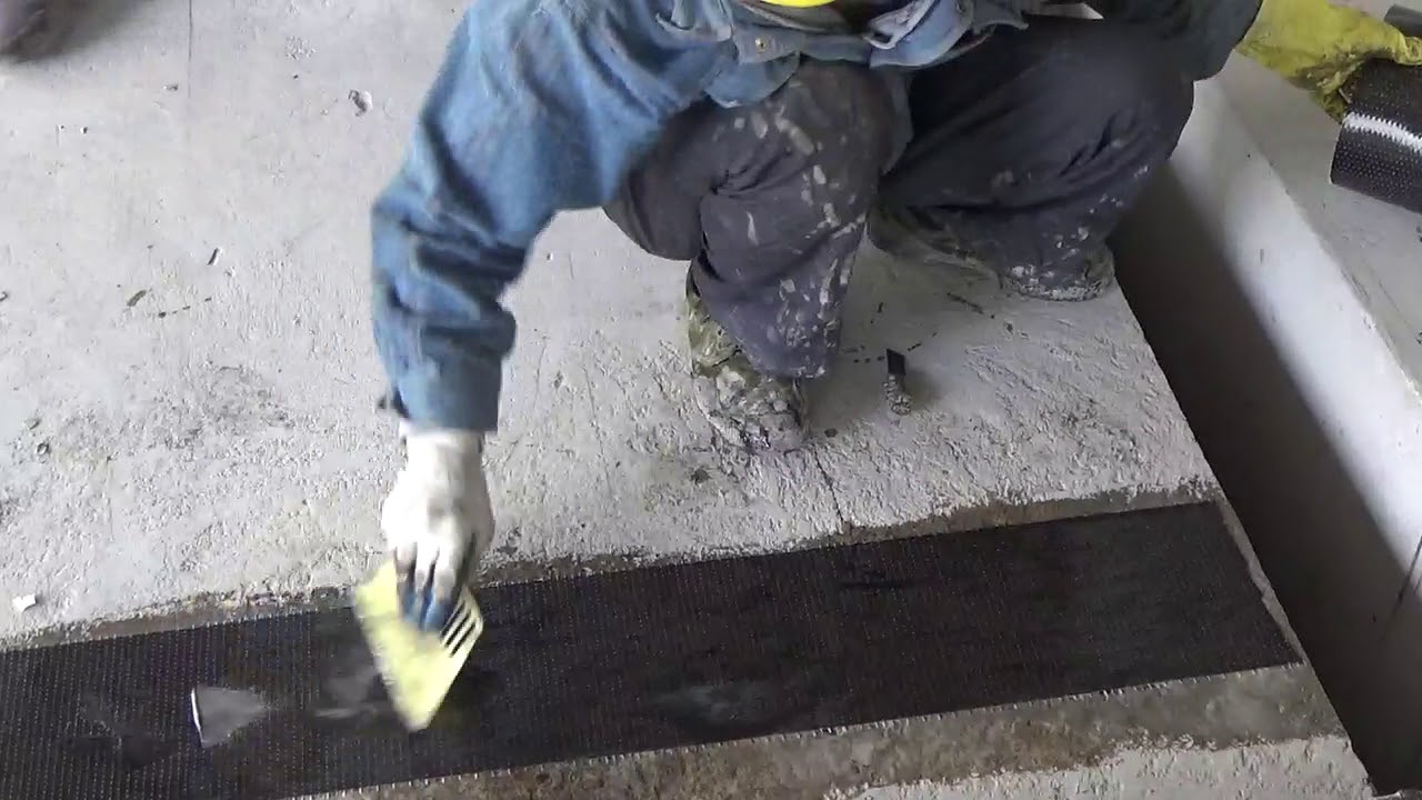 Externally bonded CFRP fabric wrapping