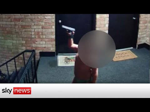Toddler waves loaded gun on CCTV from Indiana apartment block