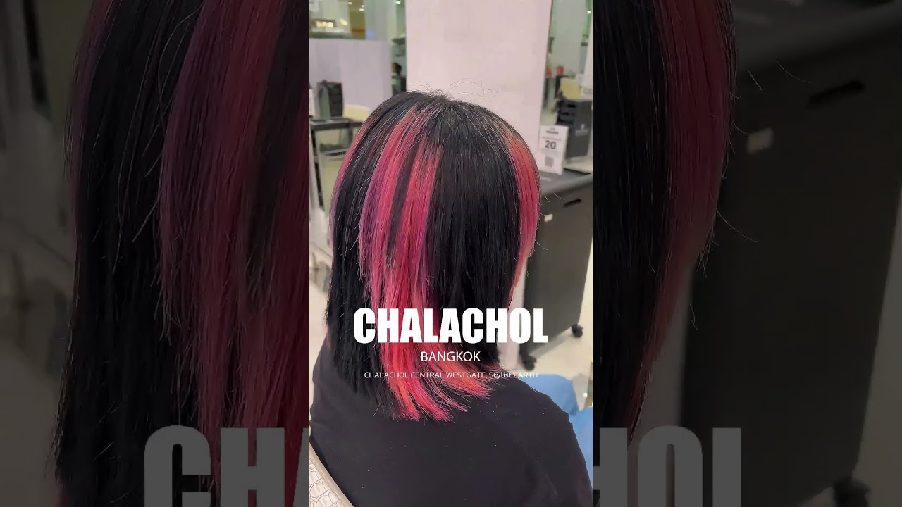"Black base with vivid pink hair highlight" 