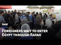 Foreigners wait to enter Egypt as wounded allowed to leave Gaza | AFP