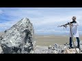 Cutting a giant rock in half with a giant gun m60