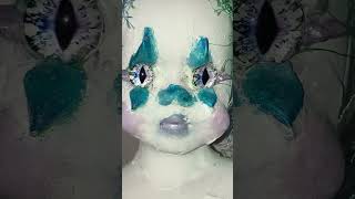 Clown-Like Porcelain Doll