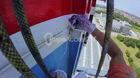 Rope acces point of view, painting walls with a roller