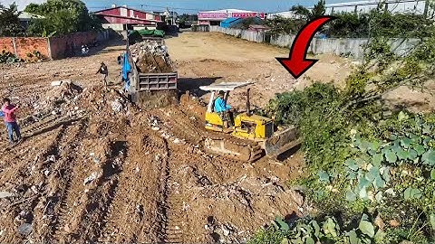 Great Technical Skill Driver Bulldozer Pushing Land Waste Cement Clear the Lake Filling Around Home