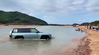 BYD Yangwang U8 driving in water and sand