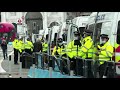 Anti-lockdown protesters scuffle with police in London